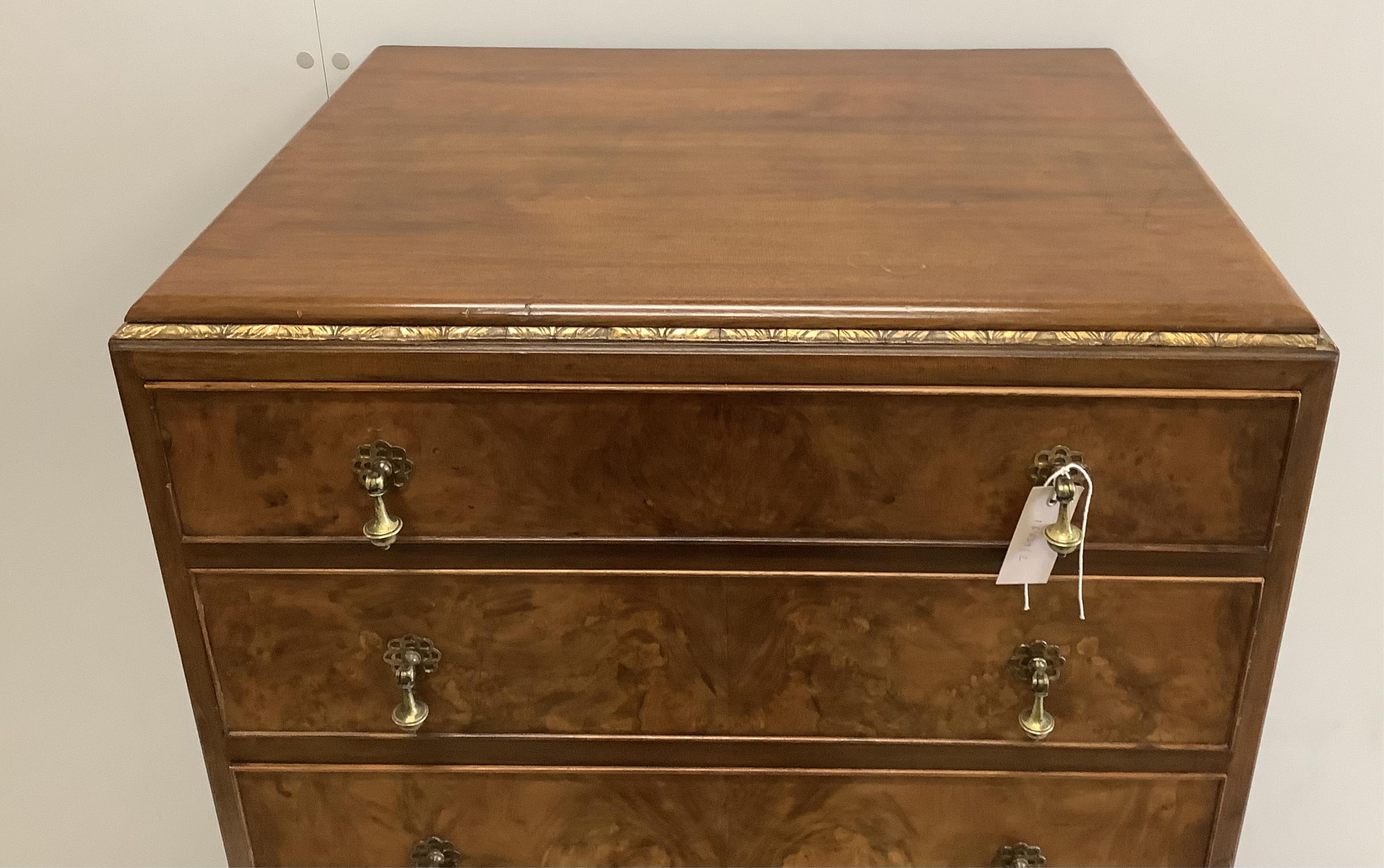 A Queen Anne Revival figured walnut and laburnam oyster veneered six drawer tall chest, width 70cm, depth 53cm, height 134cm. Condition - good